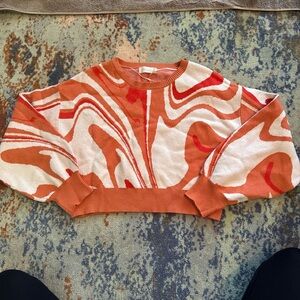 Altar'd State Swirl Patterned Orange and Cream Sweater